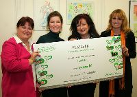 A handover of a cheque to an endowment fund Plaváček as a support for talented children